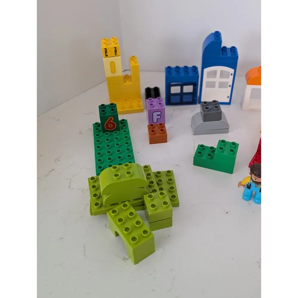 Lego Duplo Blocks In Box~ 54 Miscellaneous Pieces Including Figurine~Building